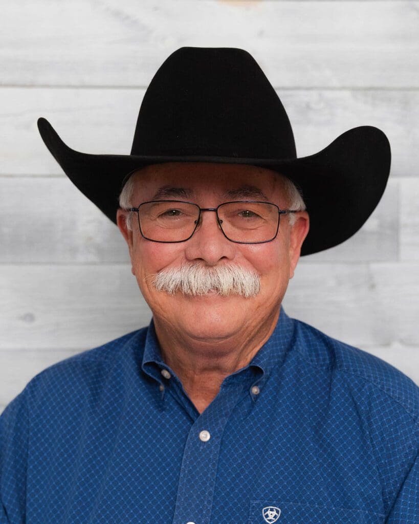 Older man wearing a western-style hat
